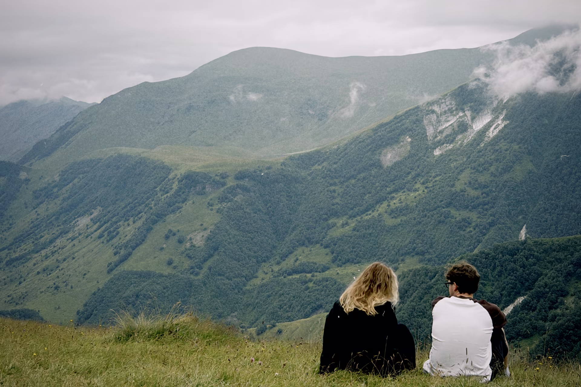 Kazbegi mountains and a couple